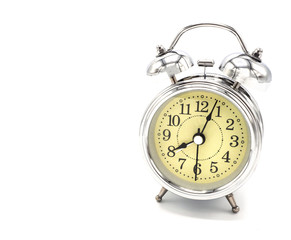 vintage retro alarm stainless clock isolated on white background