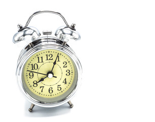 vintage retro alarm stainless clock isolated on white background