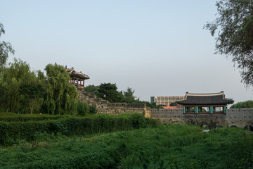 hwahongmun gate during sunset hours