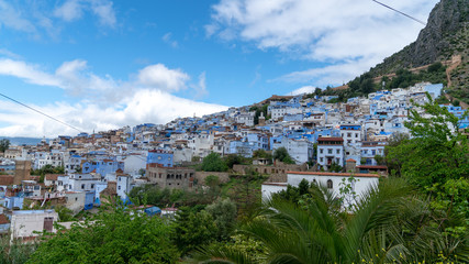 Obraz premium Chefchaouen panorama, blue city skyline on the hill, Morocco