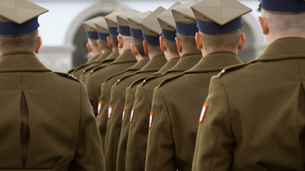 in winter, the Polish army stands on the street, soldiers are awarded award