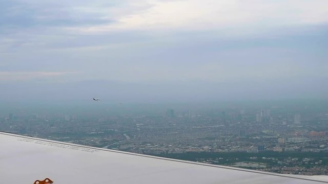 airplane flying side by side