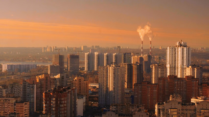 Fototapeta premium winter modern city, view from the roof of a tall house
