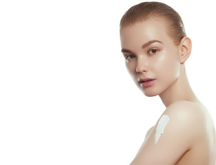 Fototapeta premium Beauty face. Beautiful Young Woman with Clean Fresh Skin touch own face and body. Facial treatment. Cosmetology, beauty and spa concept