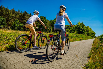 Fototapeta premium Healthy lifestyle - people riding bicycles