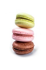 Delicious multicolored french macaroons or macaron on a white background