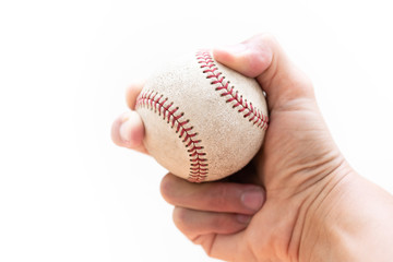 Baseball : Curveball Grip with two fingers and seams - close up on a white background with copy space.