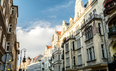 Obraz premium magnificent ancient architecture in the style of the Renaissance. Colorful and so different buildings of the ancient city of Poznan.