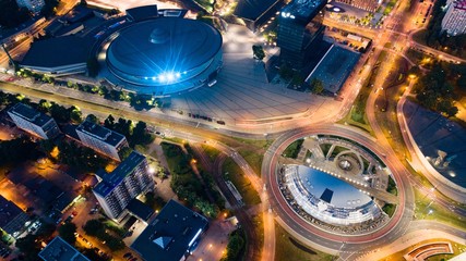 Aerial drone view on Katowice centre and roundabout at night.