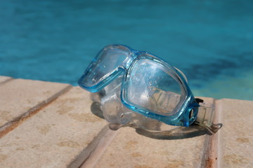 Snorkel mask by the pool