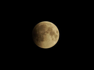 Omsk, Russia - July 28, 2018: The moment of a total lunar eclipse