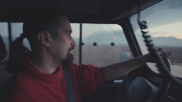 man driving a car