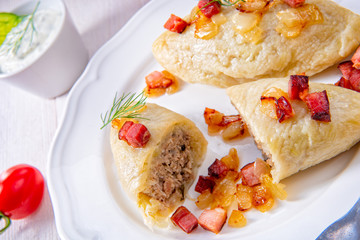 Rustic Cepelinai, a specialty Lithuanian and Polish cuisine.