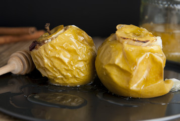 Tasty baked apples stuffed with honey and dried fruits, healthy nutrition, delicious sweet food, desset or breakfast.