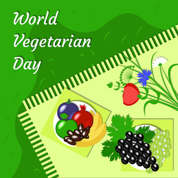 World Vegetarian Day. Fruit picnic - grass, tablecloth, plate, flowers, apple, pomegranate, dates, grapes, banana, figs