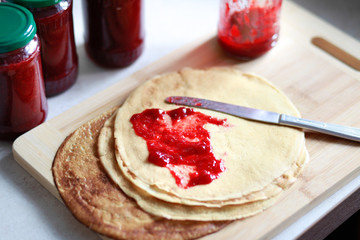 delicious homemade pancakes with sweet strawberry jam.