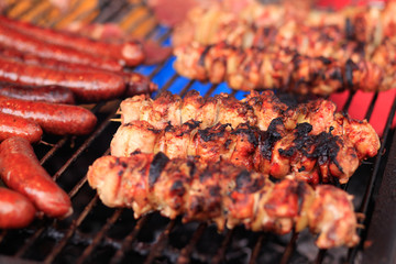 fried sausage and shashlik on the grill.