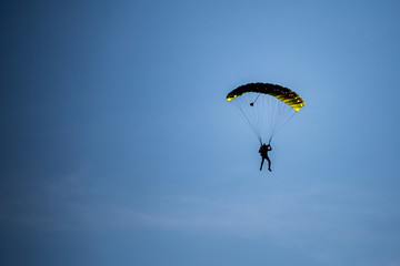 shape of a paraglider against the sky