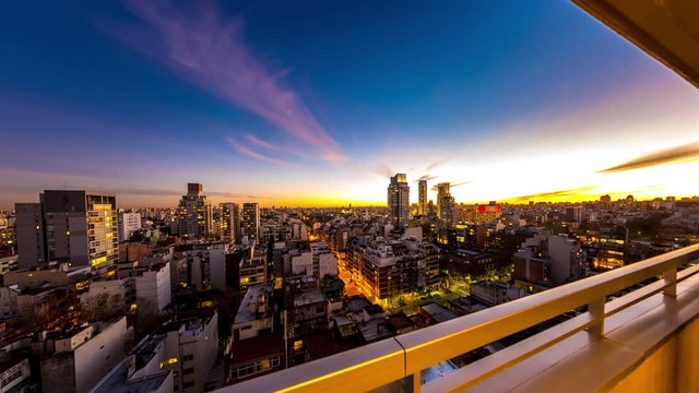 Night time-lapse view on the skyline of the city from a balcony of a high rise apartment in Buenos Aires, Argentina.
