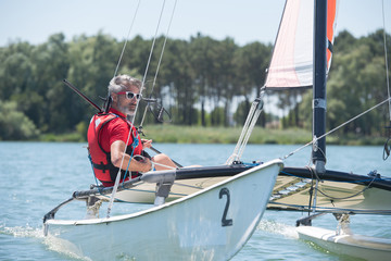 man pleasure boating on a lake