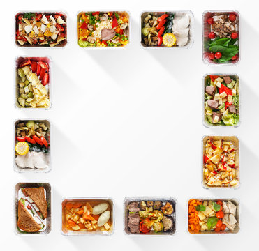 Frame made of healthy food boxes on whie background
