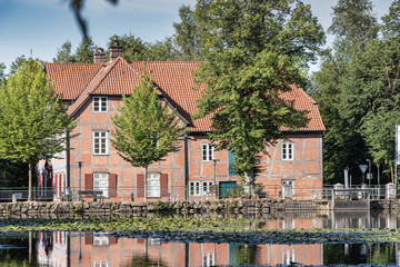 Pond Mühlenteich with the Trittau Water Mill