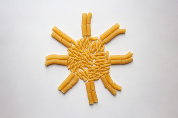 Wheat pasta sun silhouette isolated on white background from a high angle view