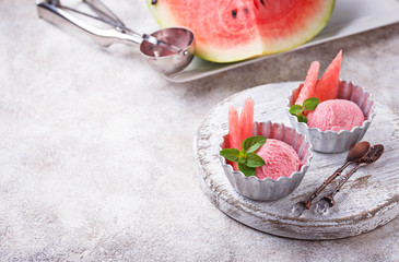 Watermelon ice cream in metal bowls 