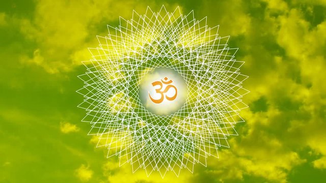 Openwork mandala with an aum / om / ohm sign against the sky in a green and yellow tonality. In the center of the mandala - the sun  rotation of the mandala and the movement of clouds. Video.