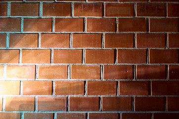 rays of light on a brick wall