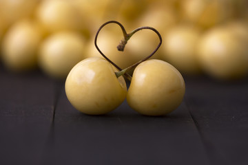 a pair yellow cherry and heart