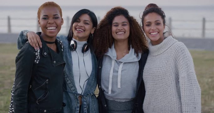 Portrait Multi Ethnic Group Of Women Laughing Enjoying Happy Reunion Beautiful Girlfriends Embracing Having Fun Together On Seaside Slow Motion