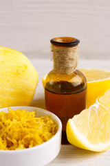 Lemon essential oil on a white background