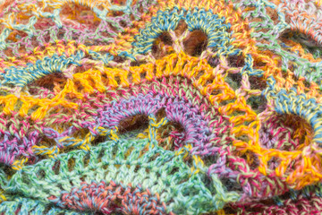 handmade multicolor crochet background with single crochet and double crochet stitches and chain stiches