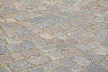 rötliches und graues Kopfsteinpflaster
