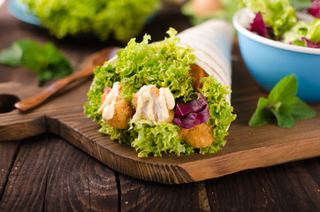 Grilled tortilla with chicken, mayo and tomato ketchu....Grilled tortilla chicken, lettuce, homemade mayo and barbeque sauce