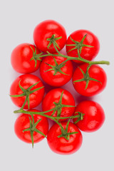 Bunch of fragrant tomato on white background. Top view. Isolated background.