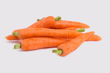 Carrots vegetables isolated. Heap of carrots on white, cut out.
