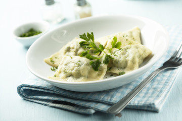 Homemade dumplings with spinach