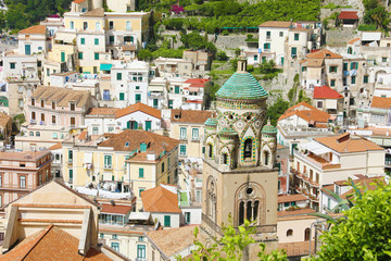 Obraz premium Stunning view of Amalfi town from above with the high ancient bell tower church, Amalfi Coast, Italy 