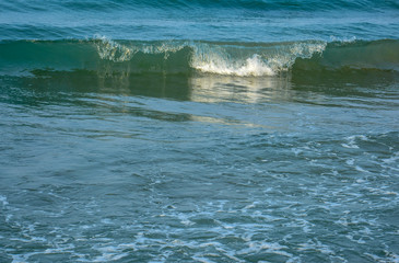 Waves on the sea in the early morning