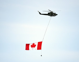Helicopter with Canadian flag © Brett