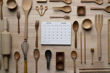 kitchen utensils and calendar, time for prepare or study for cooking