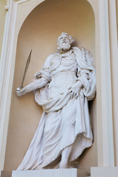 Beautiful ancient sculpture at the entrance to the cathedral on Cathedral Square in Vilnius Lithuania.