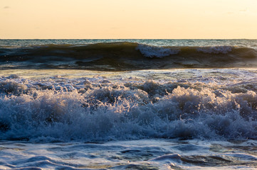 Amazing sea sunset, the sun, waves, clouds