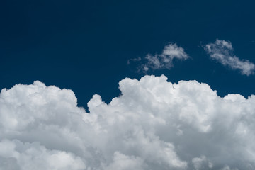 Naklejka na ściany i meble Wonderful blue sky and bright white cumulus clouds panorama