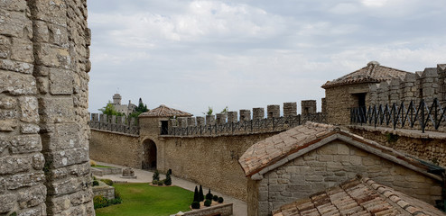 Fototapeta na wymiar Ancient and medieval wall of italian castle. Historical wonderful site