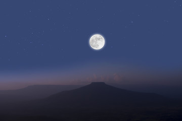 Naklejka na ściany i meble Full moon over mountains.Romantic night.