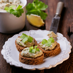 Canape with fish pate of mackerel, close up