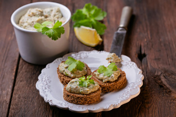 Obraz na płótnie Canvas Canape with mackerel and parsley fish paste